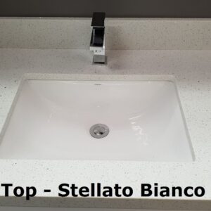 White ceramic sink on marble countertop with dark cabinet.